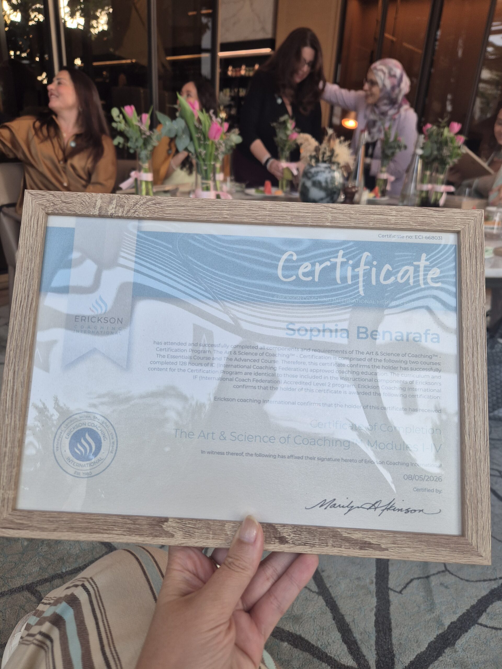 Close-up of Sophia Benarafa’s Erickson Coaching International certificate for The Art & Science of Coaching, Modules I-IV